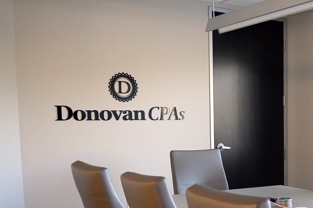 Donovan CPAs conference room logo signage