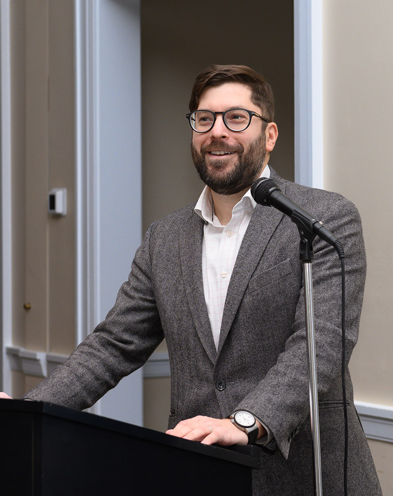 Jeff Curiel speaks at podium