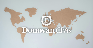 Donovan CPAs logo over world map outline