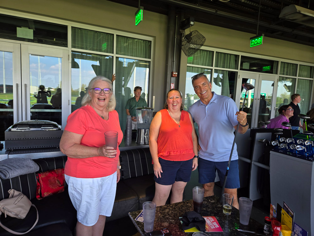 Happy team golf outing