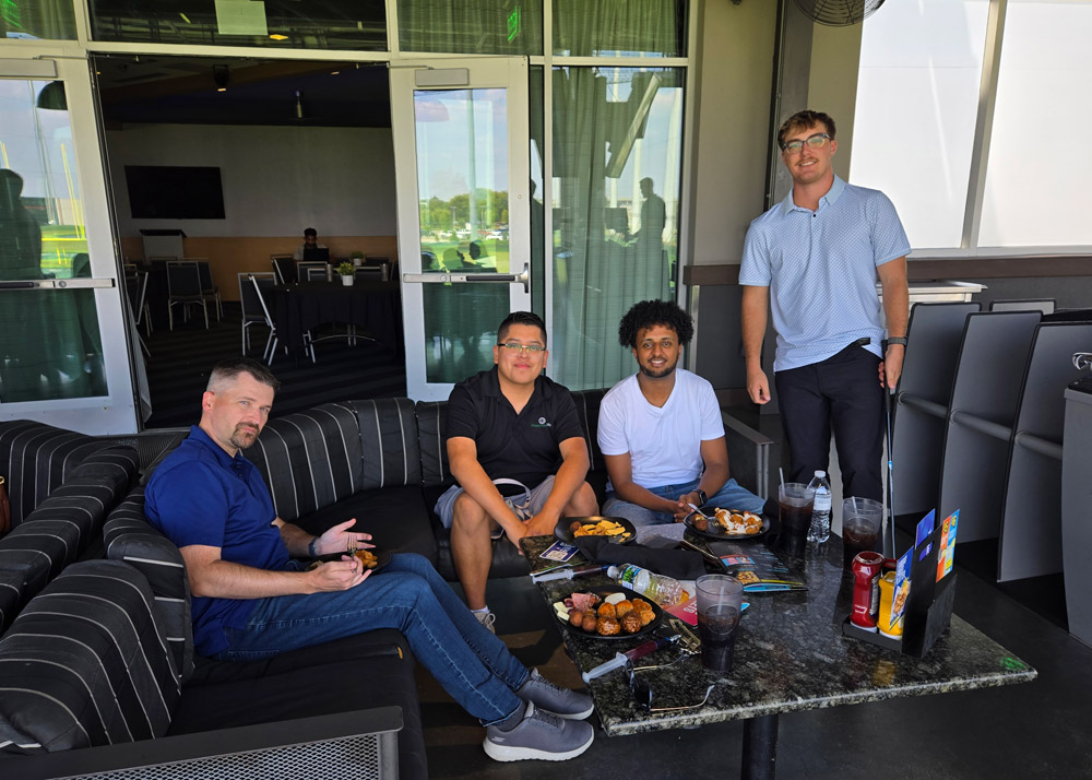 guys hanging out at team outing