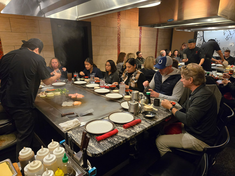 team enjoying dinner event